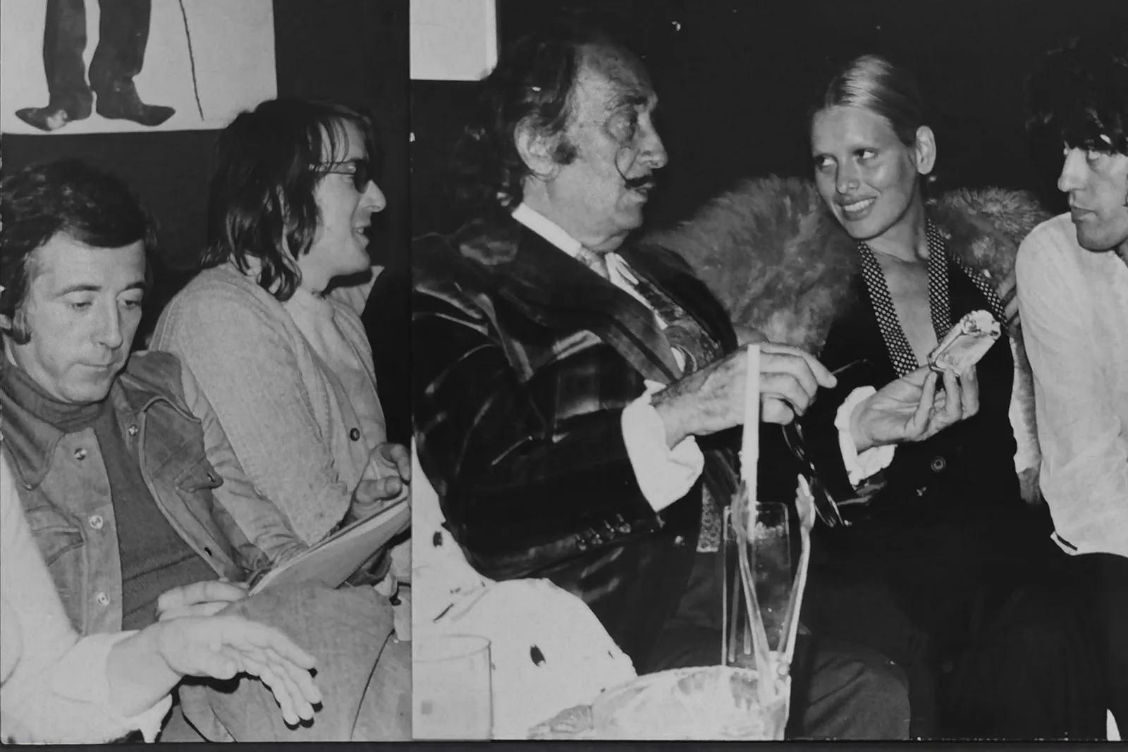 With friends, signing